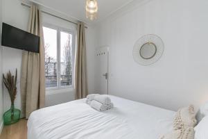 Posteľ alebo postele v izbe v ubytovaní MBA Splendide Appart - Le Raincy - Banlieue Paris