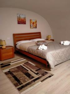 a bedroom with a bed with a bowl on it at Elmar in Bisceglie