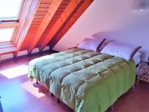 A bed or beds in a room at Beautiful holiday home in Campagnano with private terrace