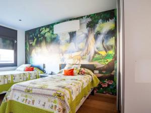 a bedroom with two beds and a painting on the wall at Villa in Castellar del Riu with Pool & Pyrenees in Castellar del Riu +32 photos