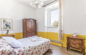 Postel nebo postele na pokoji v ubytování Podere Matilde