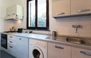 A kitchen or kitchenette at Nice Apartment In Marti Pi With Wifi