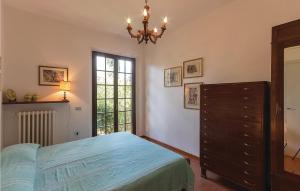 A bed or beds in a room at Nice Apartment In Marti Pi With Wifi