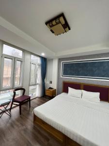 Postel nebo postele na pokoji v ubytování Holiday Suites Hotel & Spa