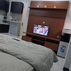 A kitchen or kitchenette at Anyak's place Syariah