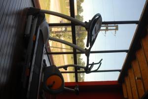 a pair of glasses hanging from a window at Aguará Hotel & Spa in Lobos