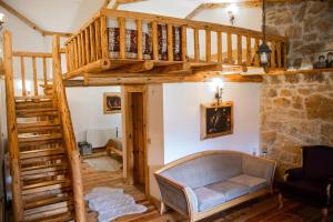 a room with a loft bed and a staircase at Mogla Tashan Hotel in Muğla