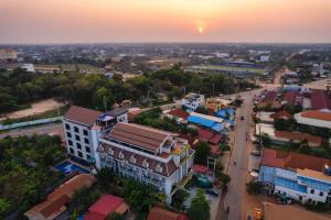 an aerial view of a city at sunset at Blanc Smith Hotel in Siem Reap