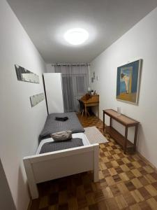 Posteľ alebo postele v izbe v ubytovaní Sweet apartman Maša + 36 fotografií