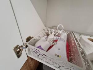 an open drawer with two objects in it at Lovely Kozi Square Studio Bedroom with Pool LV5C in Kuching