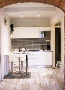 Virtuvė arba virtuvėlė apgyvendinimo įstaigoje Appartamento in via San Gallo