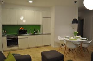Kuchyňa alebo kuchynka v ubytovaní Apartments City&style