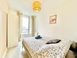 Posteľ alebo postele v izbe v ubytovaní Brest - Le Gestin - Appartements - Lumineux - Tout Confort - Fibre Internet