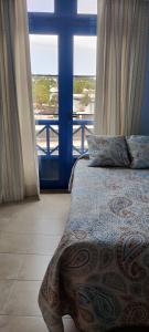 Postel nebo postele na pokoji v ubytování Playa Blanca Center Ocean View Apartment