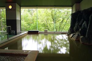 Fotografie z fotogalerie ubytování 碧の美ゆゆaonobi yuyu旧湯元白金温泉ホテル v destinaci Biei