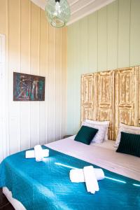 Letto o letti in una camera di Ruby 'n Emerald studio's