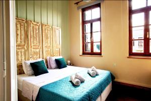 Letto o letti in una camera di Ruby 'n Emerald studio's