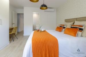 Posteľ alebo postele v izbe v ubytovaní Living4Malaga Boho Chic Apartment