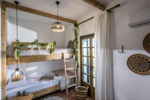A bed or beds in a room at DIEVANDI SEAVIEW VILLA