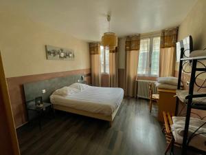 Rúm í herbergi á Hotel François 1Er
