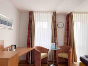 Posezení v ubytování Schöne Apartments I private Parkplätze I home2share