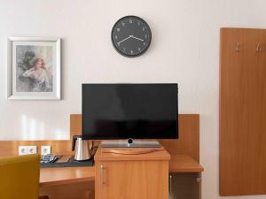 TV a/nebo společenská místnost v ubytování Schöne Apartments I private Parkplätze I home2share