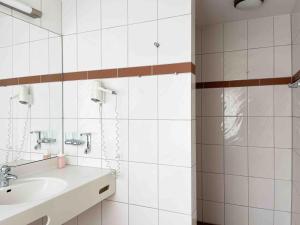 Koupelna v ubytování Schöne Apartments I private Parkplätze I home2share