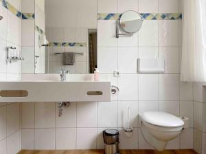 Koupelna v ubytování Schöne Apartments I private Parkplätze I home2share