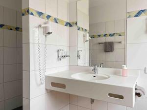 Koupelna v ubytování Schöne Apartments I private Parkplätze I home2share