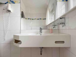 Koupelna v ubytování Schöne Apartments I private Parkplätze I home2share