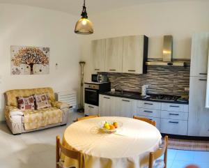Η κουζίνα ή μικρή κουζίνα στο Villa catalana al centro di Alghero +10 φωτογραφίες
