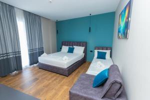 Postel nebo postele na pokoji v ubytování Hotel Viroi + 14 fotografií