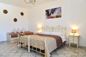 Postel nebo postele na pokoji v ubytování Masseria Peppeturro + 37 fotografií