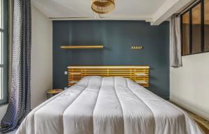 Postel nebo postele na pokoji v ubytování Bel appartement avec terrasse au cœur d'Avignon