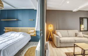 Postel nebo postele na pokoji v ubytování Bel appartement avec terrasse au cœur d'Avignon