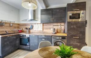 Kuchyň nebo kuchyňský kout v ubytování Bel appartement avec terrasse au cœur d'Avignon