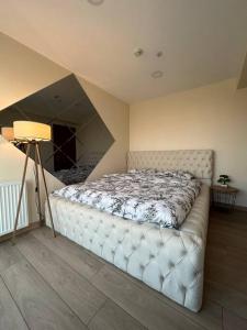 Кровать или кровати в номере Wunderschönes Apartment mit Blick aufs GoldeneHorn