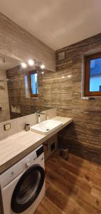 Łazienka w obiekcie Apartamenty i Domki Mierzeja