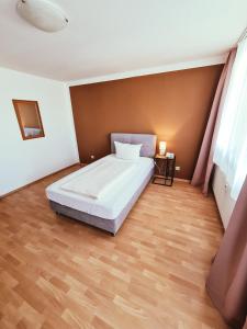 Postel nebo postele na pokoji v ubytování Zentral Hotel