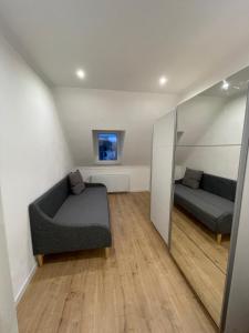 Posezení v ubytování Stadthaus Apartment Bachperle + 1 fotografie