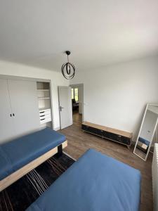 Łóżko lub łóżka w pokoju w obiekcie Gîte d'Esila