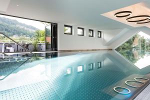 a swimming pool with a view of a house at Schmiede 7 in Beilngries