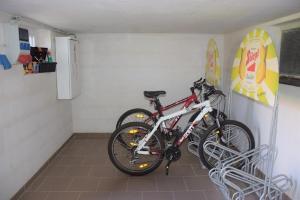 a bike is parked in a room at Gasthof Pichler in Grimmenstein