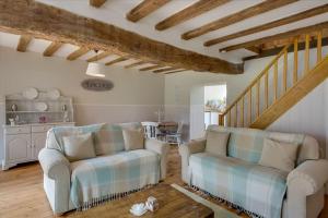 Posezení v ubytování L'Amelia Les Trois Petites Maisons