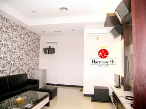TV o dispositivi per l'intrattenimento presso Hotel Harmony In & Karaoke