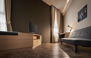 TV a/nebo společenská místnost v ubytování U Hotel Penang