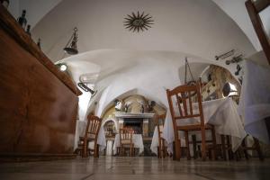 A restaurant or other place to eat at Tenute Al Bano