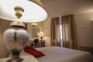 A bed or beds in a room at Tenute Al Bano