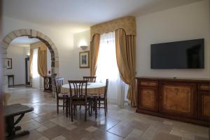 A television and/or entertainment centre at Tenute Al Bano