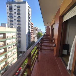 a balcony with a view of a city at LUAMAR in Mar del Plata